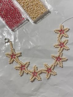 beaded stars and beads are laid out on the table