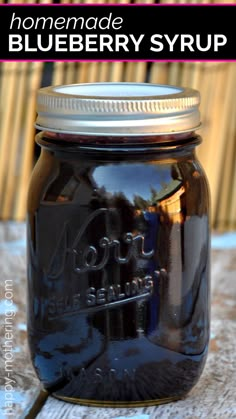 homemade blueberry syrup in a mason jar with text overlay that reads homemade blueberry syrup