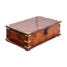 an old wooden box with brass trimmings on the top and bottom, sitting on a white background