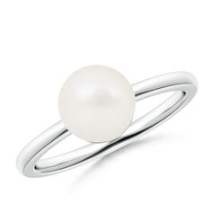 Set on silver band is a Freshwater pearl glowing magnificently. The glossy round pearl resembles the full moon and captivates the senses with its sheer elegance. It's a classic pearl ring that accessorizes well with every outfit. Cultured Pearl Ring, Pearl Rings, Classic Ring, Pearl Ring, Solitaire Ring, Silver Band, Gold Bands, Fresh Water, Freshwater Pearls