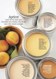 four cans of apricot sitting next to each other