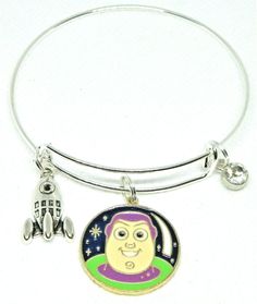 Toy Story Buzz Lightyear bangle charm bracelet. Handcrafted. Comes in jewelry pouch for gift giving. Perfect gift for someone who is into space exploration. Toy Story Buzz Lightyear, Toy Story Buzz, Bangle Bracelets With Charms, Buzz Lightyear, Space Exploration, Jewelry Pouch, Toy Story, Gift Giving, Fashion Watches