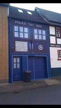 the police box is on the side of the building