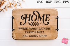 a wooden sign that says home where family gathers friends meet and roots grow on it