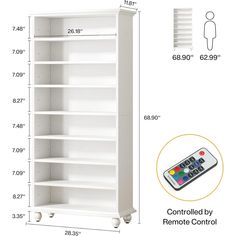 a white bookcase with remote controls and measurements