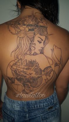 a woman with tattoos on her back