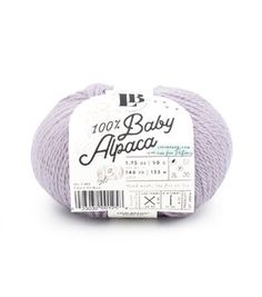 a ball of yarn with the words 100 % baby alpaca on it