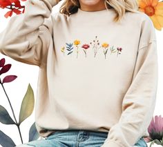 Flower Sweatshirt, Aesthetic Wild Flower Sweatshirt, Botanical Floral, Minimalist Shirts for Women, Botanical Shirt, Nature Lover Shirt How Do I Order 1- Please review all the information provided before placing an order 2- Select the item type and size using the drop down menu. 3- Select the color of the item using the following drop down menu. 4- Please add the design color (white or black) in the optional message section of the order. 5- Need more Items? Add the current item in the cart. And Floral Minimalist, Sweatshirt Aesthetic, Flower Sweatshirt, Minimalist Shirts, Flowers Botanical, Botanical Shirt, Floral Tee, Wild Flower, Fleece Sweatshirt