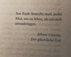 an open book with the words albert camus, der gluckliebe too