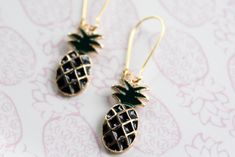 Pineapples are sign of welcome and they are fun earrings. We love pineapples so we adding them into our collection. Charm is paired with a gold plated kidney hook We use hypoallergenic, nickel free gold plated kidney hook to complete these earrings.  Measurement: 2.5 inches long  Each pair of earrings will arrive gift wrapped in a box finished with a ribbon. Pineapple Earrings, Fun Earrings, In A Box, Gold Finish, Jewelry Earrings Dangle, Hippie Boho, Pineapple, Cool Designs, Dangle Earrings