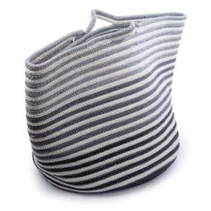 a gray and white striped bag on a white background