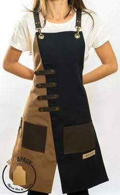 a woman is wearing an apron with straps