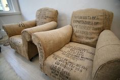 two chairs made out of burlocks sit in the corner of a living room