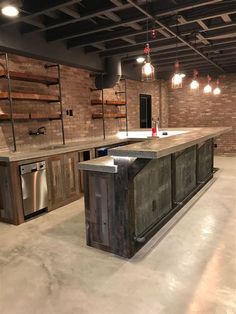 a kitchen with an island made out of pallets