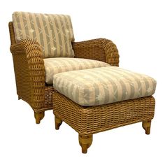 a wicker chair and footstool with a striped seat cover on top of it