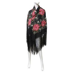 A beautiful flower embroidered 1920s silk piano shawl. It is comprised of black silk cover in vibrant pink embroidered flowers. It has 14" long silk fringe around it's circumference. 52 X 52" Plus 14" Fringe Piano Shawl, Shawl Black, Full Length Coat, A Beautiful Flower, Black Windbreaker, Velvet Coat, Maxi Coat, Print Coat, Silk Wool