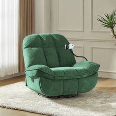 a green reclining chair sitting on top of a rug in a living room next to a potted plant