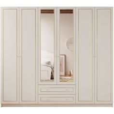 an image of a bedroom setting with white wardrobes and mirrors on the door side