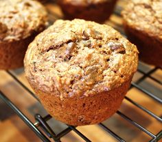 several muffins cooling on a wire rack