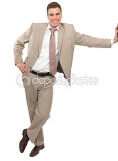 a man in a suit and tie is jumping with his arms spread out to the side