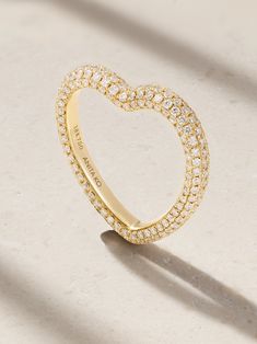 Anita Ko's ring is designed to resemble a heart, making it the perfect way to show someone how much you love them. It's cast from 18-karat gold and set with 1.50-carats of diamond that have been pavéd under a microscope and set by hand. Wear it on your middle or index finger. Luxury Heart Shaped Diamond Ring For Formal Occasions, Luxury 14k Gold Heart Ring With Vs Clarity, Heart Cut Diamond Jewelry With Halo, Yellow Gold Jewelry For Valentine's Day, Luxury Heart-shaped Diamond Ring, Luxury Heart Cut Diamond Ring, Luxury Yellow Gold Heart Cut Jewelry, Luxury Heart Ring For Wedding, Heart-shaped Yellow Gold Diamond Ring