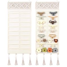 two white wall hangings with different types of buttons and clips on them, one has tassels attached to it