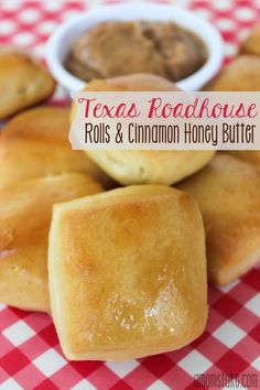 texas roadhouse rolls and cinnamon honey butter on a checkered tablecloth with dipping sauce