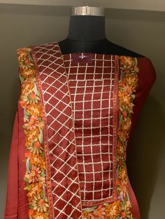 A stunningly marvellous outfit featuring Kashmiri Aari embroidery fused with hand Gota work. - - - - - - - - - - - - - - - - - - - - Product Details- Condition: Brand New- Colour: RedF A B R I CShirt: Viscose GeorgetteDupatta: ChiffonLower: Indian CrepeF I N I S HUnstitched/Semi-StitchedYou can get it stitched locally.47+ inches of Shirt Length and up to full sleeves length.StitchedWant something ready to wear, we can stitch it for you. Let us know the type of lining you require (cotton or shant Elegant Churidar With Floral Embroidery And Traditional Drape, Festive Art Silk Kurta With Floral Embroidery, Elegant Churidar With Floral Embroidery In Chanderi, Elegant Chanderi Churidar With Floral Embroidery, Festive Kurta With Floral Embroidery For Diwali, Red Silk Churidar With Resham Embroidery, Anarkali Churidar With Floral Embroidery For Transitional Season, Semi-stitched Silk Kurta With Floral Embroidery, Bollywood Style Unstitched Suit With Resham Embroidery For Festivals