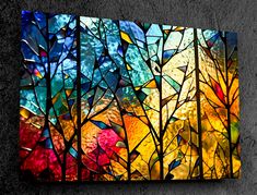 an abstract stained glass painting on the wall