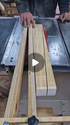 a man is working on some wood with a table sawtoothing tool in front of him