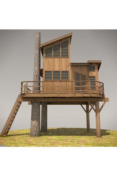 a tree house built on top of a wooden platform