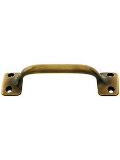 an antique brass door handle on a white background