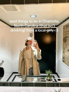 a woman taking a selfie in a mirror with the caption best things to do in charlotte, north carolina that isn't drinking from a local guy 3