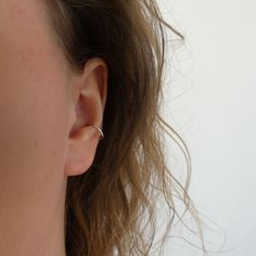 You don't need a pierced conch for this earring! The ends are carefully rounded so that they do not feel sharp on the skin. Bend the ring open like the instruction photo and place over the ear cup and close again. Stays put! Handmade from 925 sterling silver, 2mm thick. Conch Ring, Piercing Conch, Faux Piercing, Conch Hoop, Conch Earring, Arm Bracelets, Earring Silver, Fake Piercing, Shell Ring