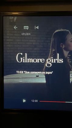 a television screen with the words gilmore girls on it