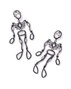 Don’t be spooked—novelty earrings are so on trend! The Skeleton Gunmetal Statement Earrings in Ivory Mother-of-Pearl are the perfect pair for every spooky season fanatic. Adorably arranged in a dangling skeleton shape, these earrings are sure to be the talk of your Halloween party. They’re convertible, too: wear them as a statement or a simple skull stud. Metal Gunmetal Over Brass Material Ivory Mother Of Pearl Closure Ear Post Size 2.86"L X 1.06"WDue to the one-of-a-kind nature of the medium, exact colors and patterns may vary slightly from the image shown. | Kendra Scott Skeleton Gunmetal Statement Earrings in Ivory Mother-of-Pearl | Mother Of Pearl Dainty Jewelry Necklace, Gunmetal Earrings, Simple Skull, Novelty Earrings, Skeleton Earrings, Engagement Rings Sale, Character Board, Bar Jewelry, Engraved Initials