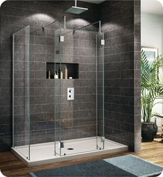 a walk in shower sitting next to a tiled wall with shelves on the side and lights above it