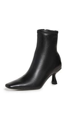 PRICES MAY VARY. Leather sole with rubber heel cap Padded leather footbed Heel: 2.75in / 70mm Leather lining Square toe Thandy Curved Heel Ankle Boots Ankle Shoes, Chunky Heels Boots, Black Heel Boots, Shoe Inspo, Heel Ankle Boots, Heel Caps, Loeffler Randall, Ankle Bootie, Shoes Booties