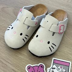 Womens Kawaii Aesthetic Hello Kitty Clogs Sandals Please refer to the size chart below before ordering. The newest Hello Kitty shoes for women are here - enter the cork sole Hello Kitty clogs. Featuring adorable Hello Kitty designs, they're lightweight, comfortable, and perfect for casual wear. With a slip-on style and breathable material, these clogs add a playful, charming touch to any outfit, embodying the essence of kawaii fashion. *Standard shipping time to the US is 9-19 business days. Please consult our shipping page for shipping time estimates for other countries. *Please check the measurements/size chart very carefully when ordering from The Kawaii Factory. Most of our clothes come in Asian sizes, which are generally 1-2 sizes smaller than US/EU sizes. Buyers shall bear the full c Hello Kitty Birkenstock, Cute Birkenstocks, Birkenstock Aesthetic, Anime Slippers, Bedazzled Shoes, Deodorize Shoes, Hello Kitty Cute, Pretty Sneakers, Hello Kitty Shoes