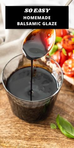 homemade balsamic glaze is being poured into a bowl with tomatoes in the background