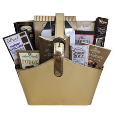 a basket filled with lots of different types of chocolates and other things in it