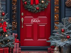 a red front door decorated for christmas with presents