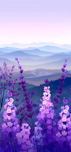 purple flowers are in the foreground with mountains in the background