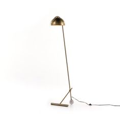 a floor lamp with a long arm and a light bulb on the end, sitting in front of a white background