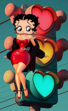 a woman in a red dress is sitting on a traffic light with heart shaped balloons behind her