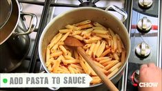 pasta being cooked in a pot on the stove