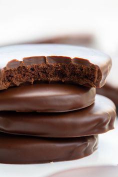 chocolate covered cookies stacked on top of each other