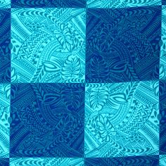 a blue and white quilt with an abstract design