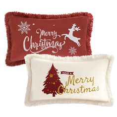 two pillows with christmas designs on them, one is red and the other is white