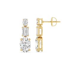 These diamond drop earrings exude both an air of sophistication and playfulness. They feature a trio of sparklers: an oval diamond on a post, an emerald-cut middle diamond, and a bigger oval diamond drop. All gemstones are mounted securely on four-prong baskets. With a length that's just right, these drop earrings can add a delicate layer and a chic touch to your ensembles. Diamond Shop, Gorgeous Engagement Ring, Diamond Drop Earrings, Diamond Drops, Oval Diamond, High Quality Jewelry, Metal Rings, Diamond Shapes, Ring Sets